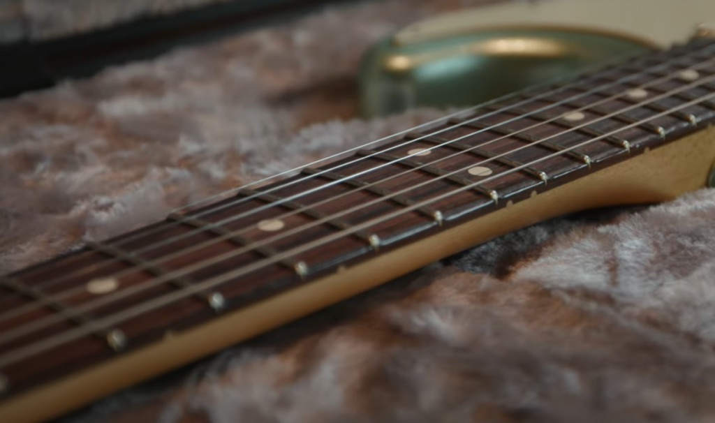 Can One String Material Wear Out Frets More Than Others?